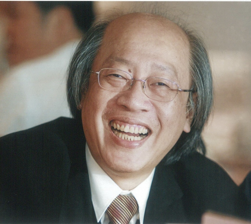 郭居士笑容燦爛,相片拍攝於十多年前。他表示自己最喜歡這張由陳燕輝校長拍攝的相片。